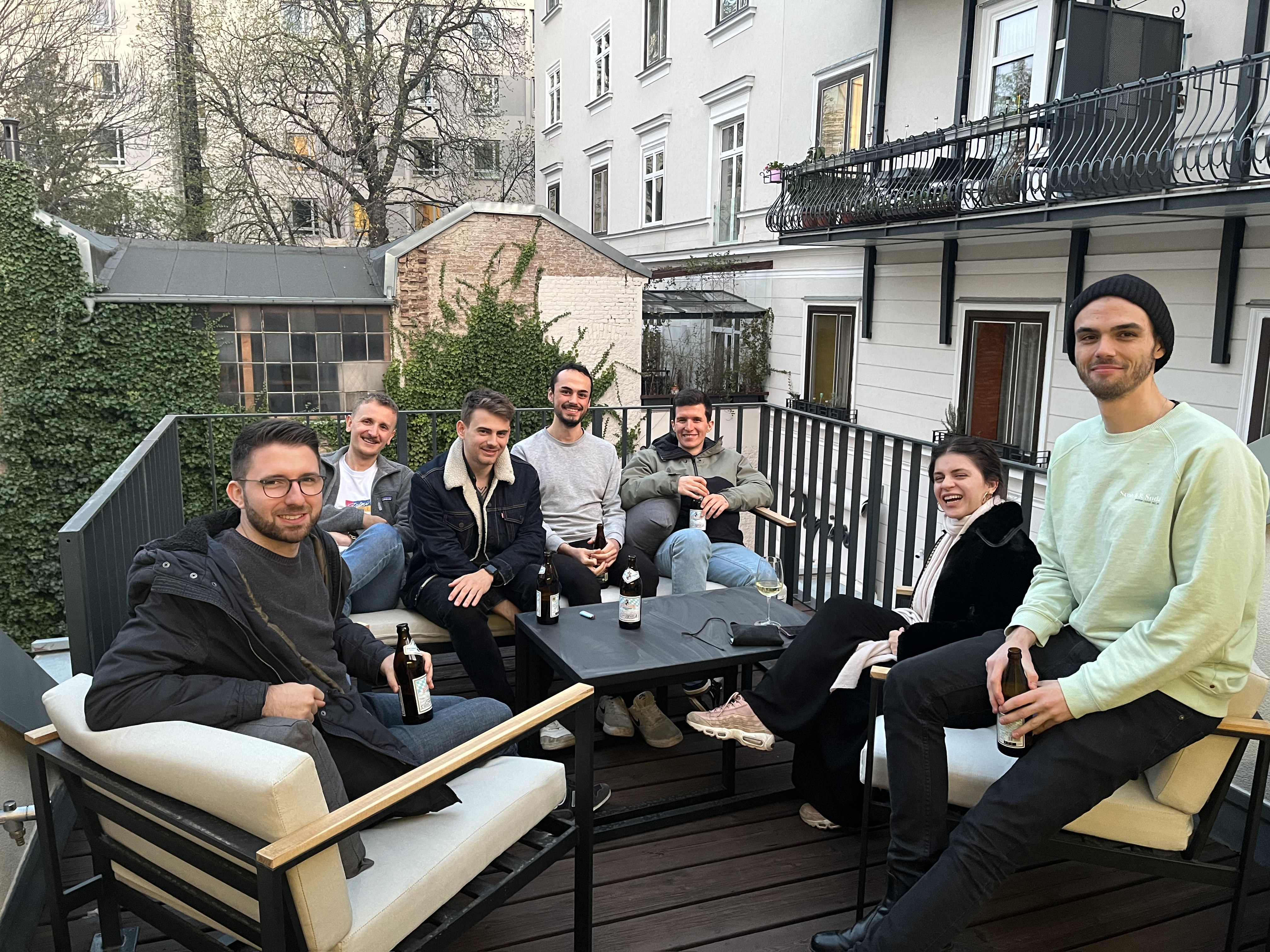 The team relaxing at our terrace after work.